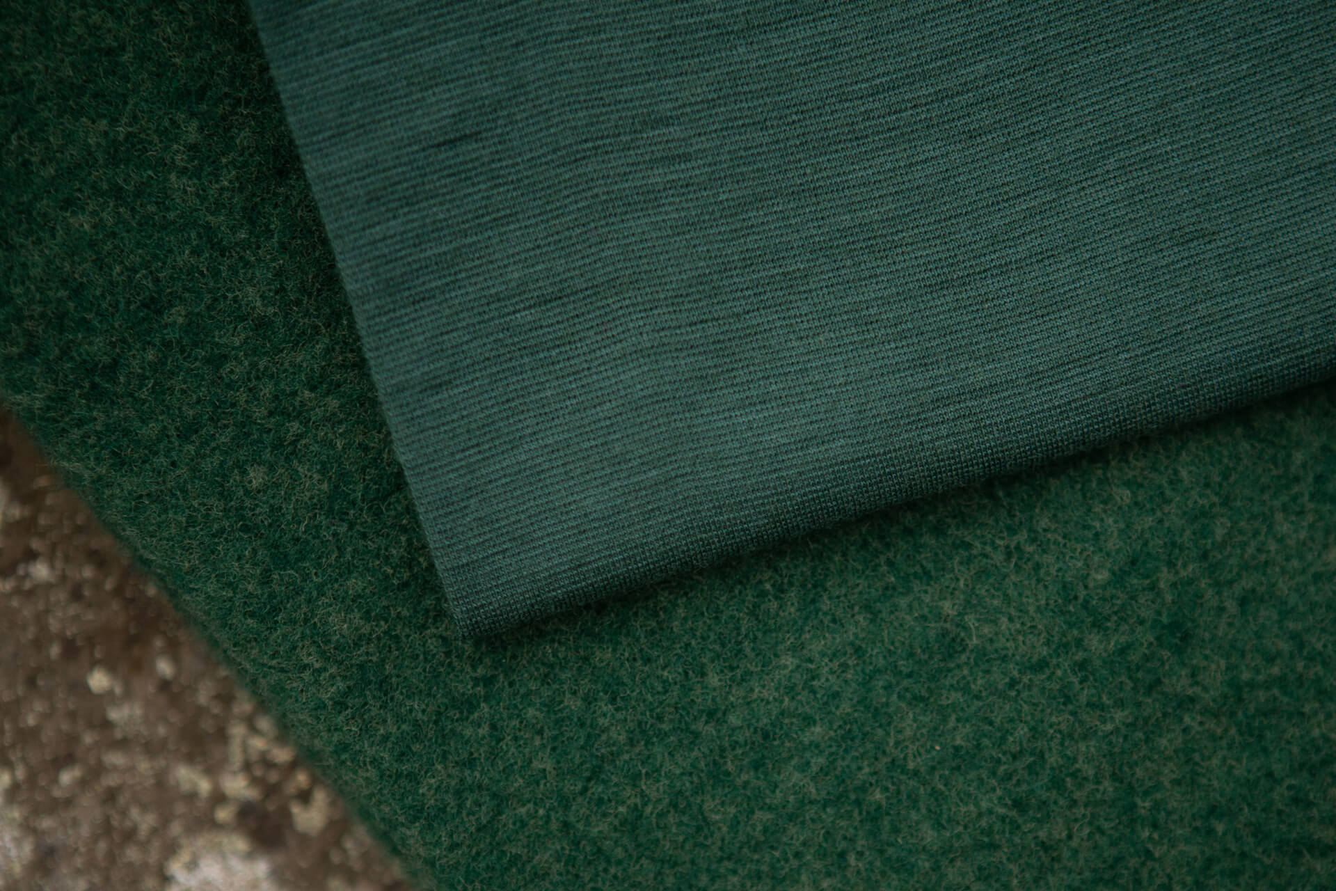 Bio Merino Kuschelfleece tiefgrün meliert von oben